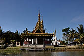 Inle Lake Myanmar. All the buildings are constructed on piles. Residents travel around by canoe, but there are also bamboo walkways and bridges over the canals, monasteries and stupas. 